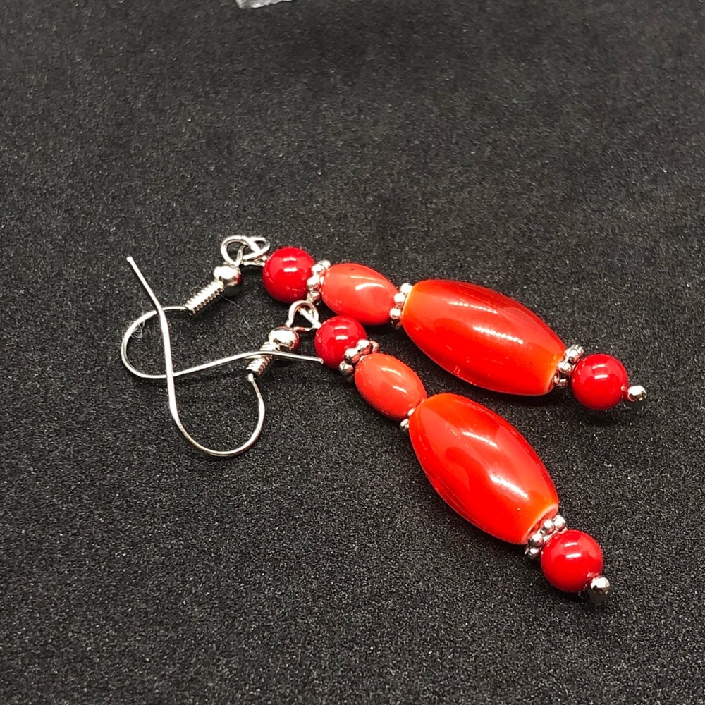 Orange segmented glass bead dangle earrings